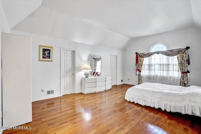 48 Joseph St, Manalapan, NJ 07726 - bedroom with vaulted ceiling, wood finished floors, and baseboards