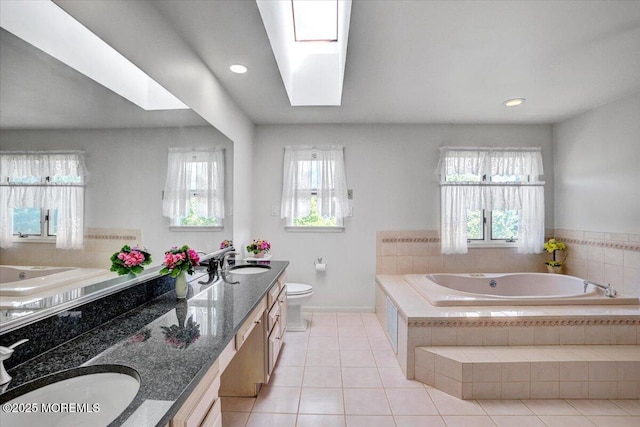 48 Joseph St, Manalapan, NJ 07726 - full bath with a garden tub, tile patterned floors, toilet, double vanity, and recessed lighting