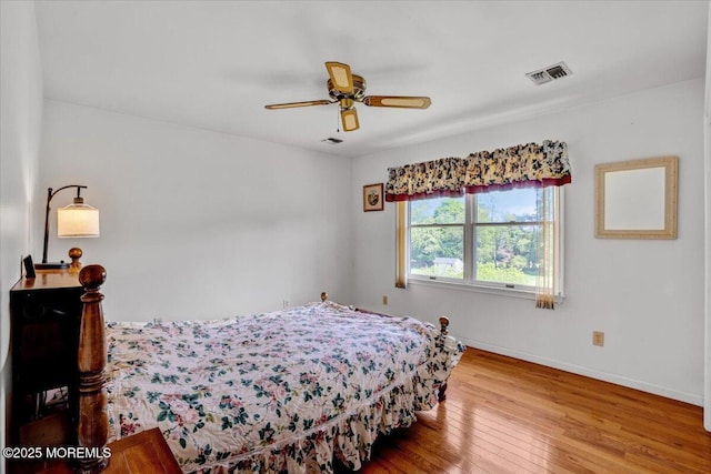 48 Joseph St, Manalapan, NJ 07726 - bedroom with hardwood / wood-style floors, baseboards, and ceiling fan