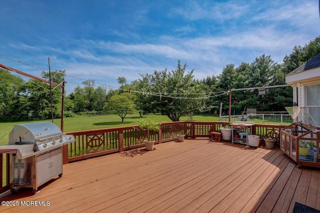 48 Joseph St, Manalapan, NJ 07726 - deck featuring a yard, view of scattered trees, and a grill