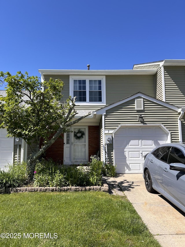 3 Birch Ln, Eatontown, NJ 07724 - view of front of home with a garage, concrete driveway, and brick siding