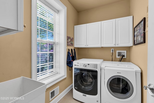 11 Aspen Ln, Tinton Falls, NJ 07724 - washroom with cabinet space, independent washer and dryer, baseboards, and light tile patterned floors