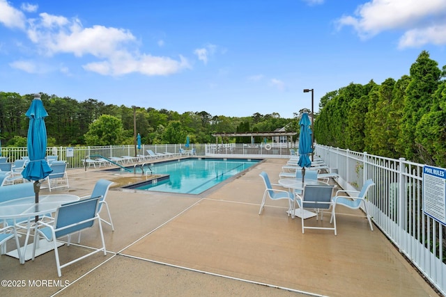 144 Sandpiper Rd, Barnegat, NJ 08005 - community pool with fence and a patio