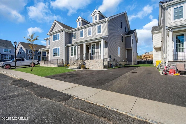 25 Blue River Way, Lakewood, NJ 08701 - view of front of house with a porch and a residential view