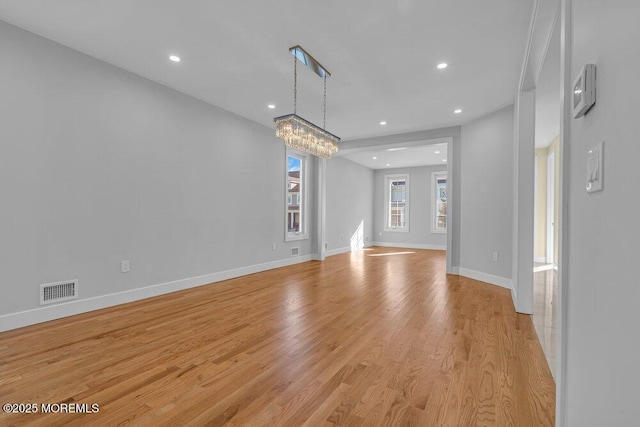 25 Blue River Way, Lakewood, NJ 08701 - unfurnished dining area with recessed lighting, light wood-style flooring, baseboards, and a chandelier