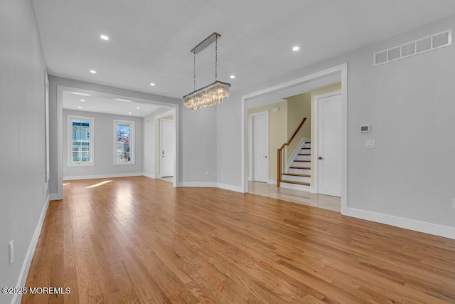 25 Blue River Way, Lakewood, NJ 08701 - unfurnished living room with stairs, a chandelier, light wood-type flooring, baseboards, and recessed lighting