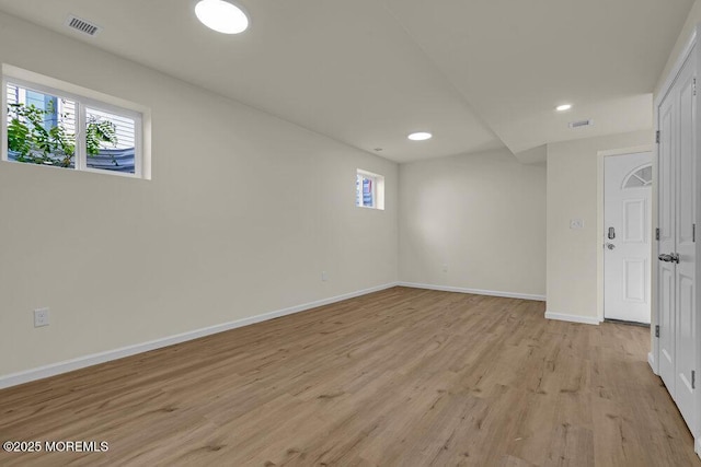 25 Blue River Way, Lakewood, NJ 08701 - unfurnished room featuring healthy amount of natural light, baseboards, light wood-type flooring, and recessed lighting