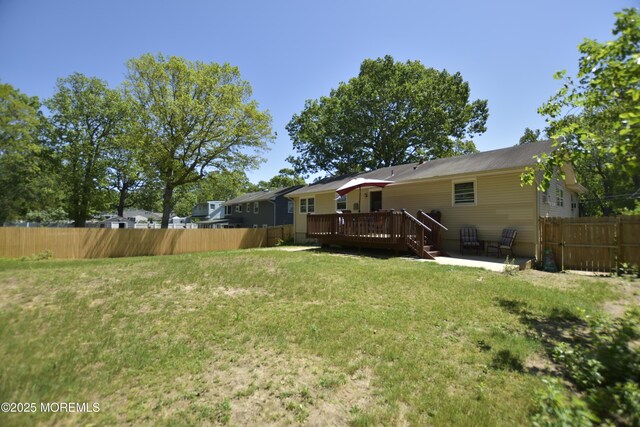 1595 Forge Pond Rd, Brick, NJ 08724 - view of yard featuring a wooden deck and a patio area