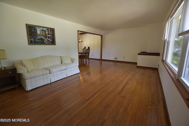 1595 Forge Pond Rd, Brick, NJ 08724 - living room with wood finished floors and baseboards
