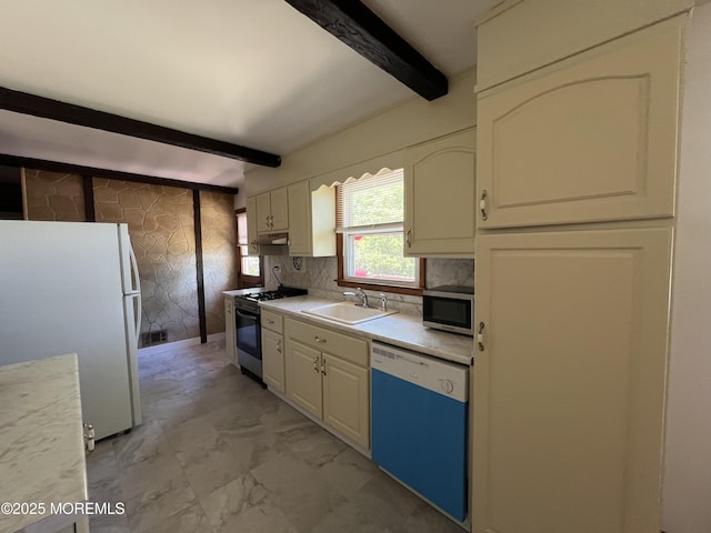 1595 Forge Pond Rd, Brick, NJ 08724 - kitchen featuring range with gas cooktop, dishwashing machine, freestanding refrigerator, a sink, and beamed ceiling