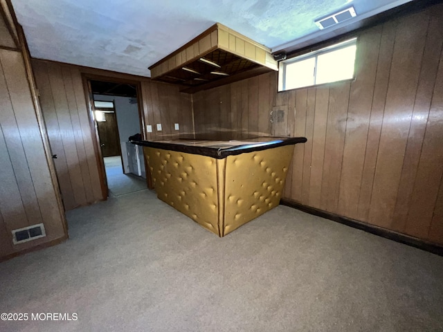 1595 Forge Pond Rd, Brick, NJ 08724 - indoor dry bar with wooden walls and light carpet
