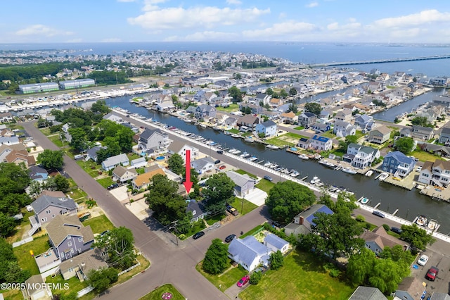 129 Foster Rd, Toms River, NJ 08753 - aerial view of property and surrounding area featuring a large body of water and nearby suburban area