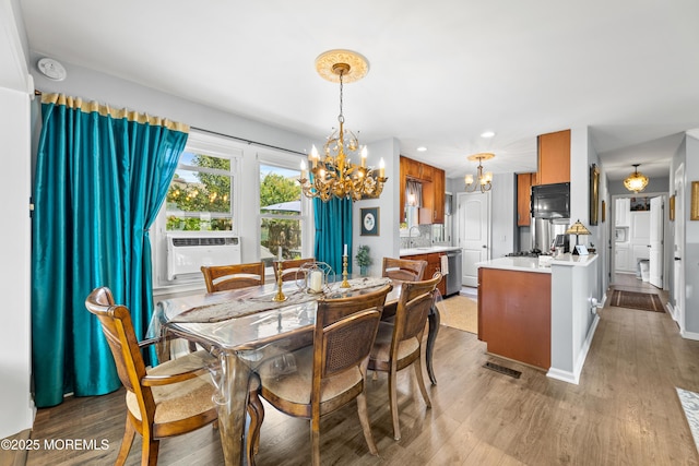 129 Foster Rd, Toms River, NJ 08753 - dining area featuring a chandelier, dark wood finished floors, cooling unit, baseboards, and recessed lighting
