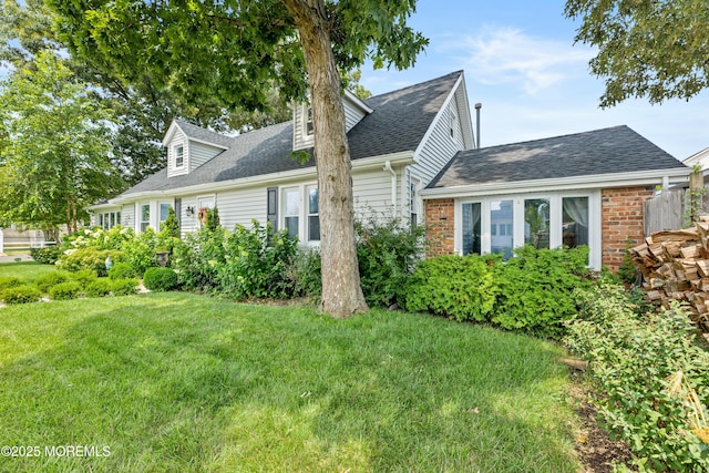 129 Foster Rd, Toms River, NJ 08753 - view of front facade with a front lawn and a shingled roof