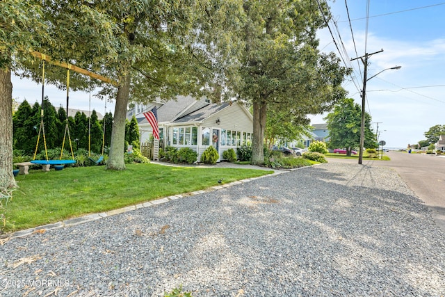 129 Foster Rd, Toms River, NJ 08753 - view of property hidden behind natural elements with a front yard