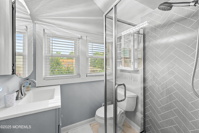 129 Foster Rd, Toms River, NJ 08753 - bathroom featuring a stall shower, healthy amount of natural light, toilet, and vanity