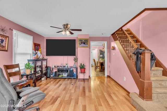 25 Union Ave, Freehold, NJ 07728 - living area with stairway, a ceiling fan, wood finished floors, and baseboards