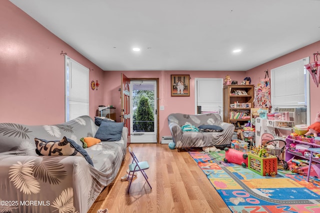 25 Union Ave, Freehold, NJ 07728 - living area featuring light wood-type flooring, recessed lighting, and baseboard heating