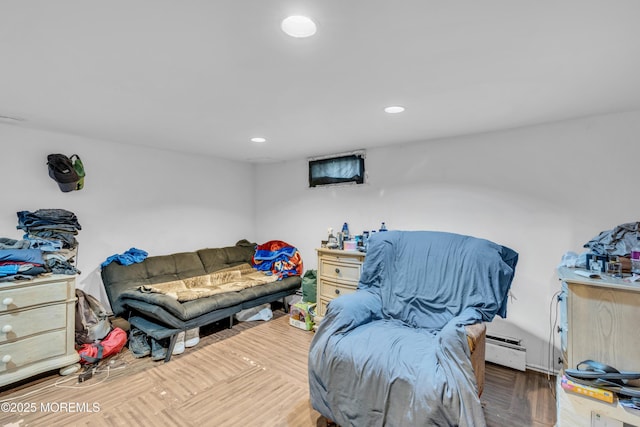 25 Union Ave, Freehold, NJ 07728 - living room with a baseboard heating unit, recessed lighting, and wood finished floors