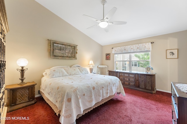 bedroom featuring carpet flooring, vaulted ceiling, baseboards, and ceiling fan