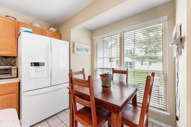 dining room featuring light tile patterned floors