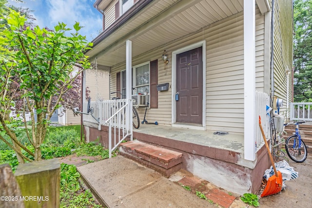 11 Factory St, Freehold, NJ 07728 - view of exterior entry featuring a porch