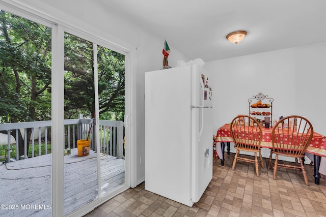 11 Factory St, Freehold, NJ 07728 - dining area featuring brick patterned floors
