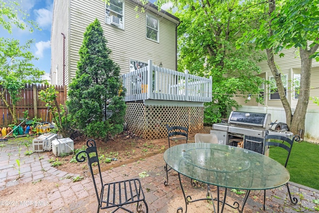 11 Factory St, Freehold, NJ 07728 - view of patio / terrace with a deck, fence, outdoor dining space, and area for grilling