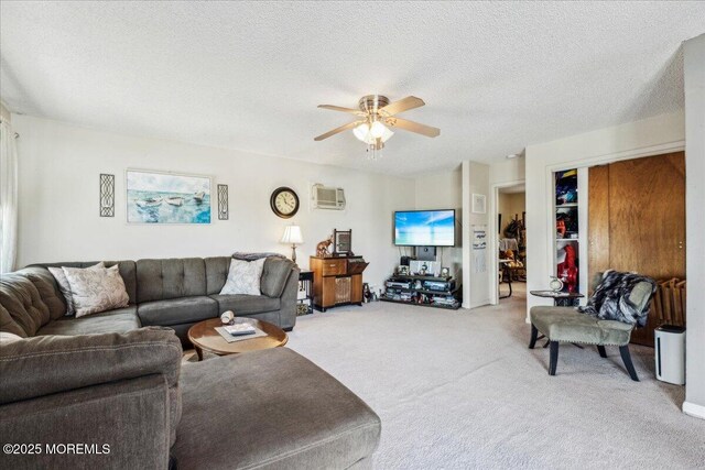19 Acapulco Dr, Brick, NJ 08723 - living area with a ceiling fan, light carpet, a textured ceiling, and a wall unit AC