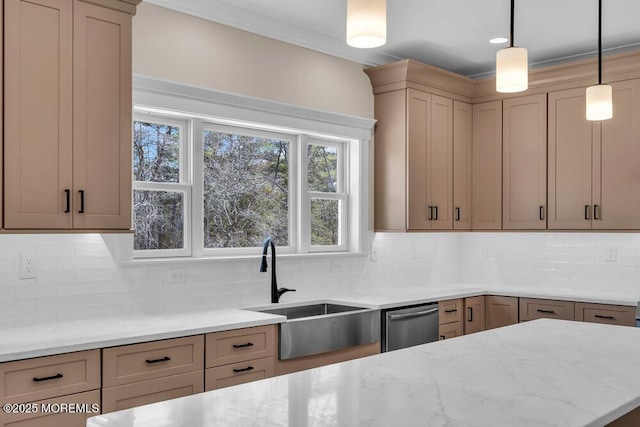 kitchen with dishwasher, a sink, light stone counters, backsplash, and hanging light fixtures