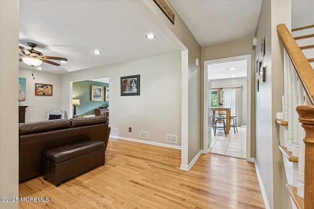 19 Meadowbrook Ln, Freehold, NJ 07728 - living area featuring ceiling fan, light wood-style floors, recessed lighting, baseboards, and stairs