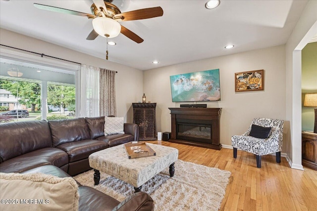 19 Meadowbrook Ln, Freehold, NJ 07728 - living area with ceiling fan, light wood-style floors, a glass covered fireplace, recessed lighting, and baseboards