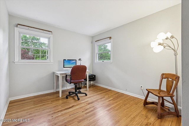 19 Meadowbrook Ln, Freehold, NJ 07728 - office area with light wood-style floors and baseboards