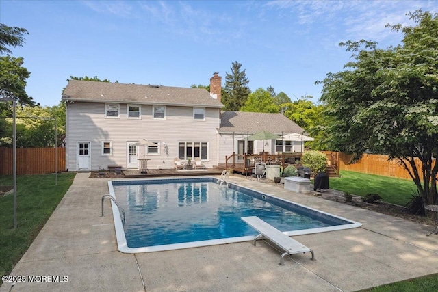 19 Meadowbrook Ln, Freehold, NJ 07728 - view of pool with a wooden deck, a patio, and a diving board