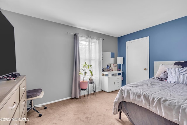 716 Zlotkin Cir Unit 1, Freehold, NJ 07728 - bedroom with light carpet and baseboards