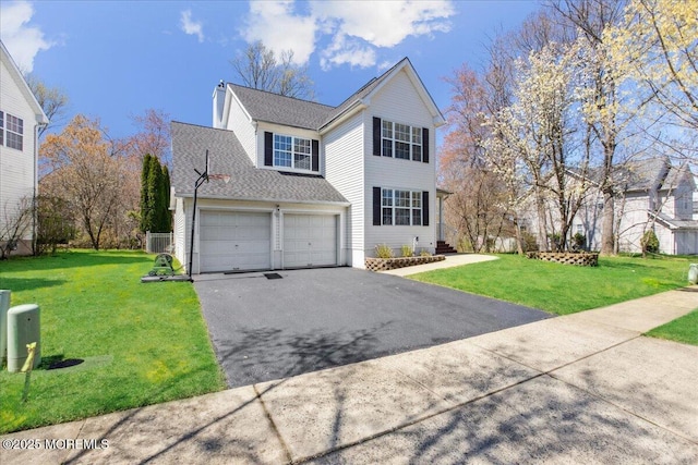 34 Crescent Rd, Old Bridge, NJ 08857 - traditional-style home featuring asphalt driveway, a front lawn, roof with shingles, and a chimney