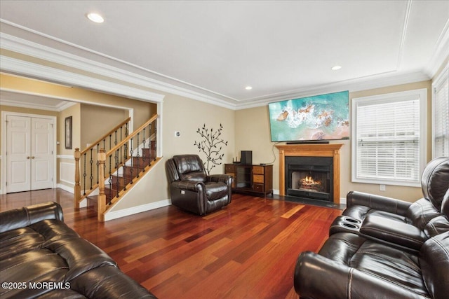 34 Crescent Rd, Old Bridge, NJ 08857 - living room with wood finished floors, crown molding, a fireplace with flush hearth, stairs, and recessed lighting