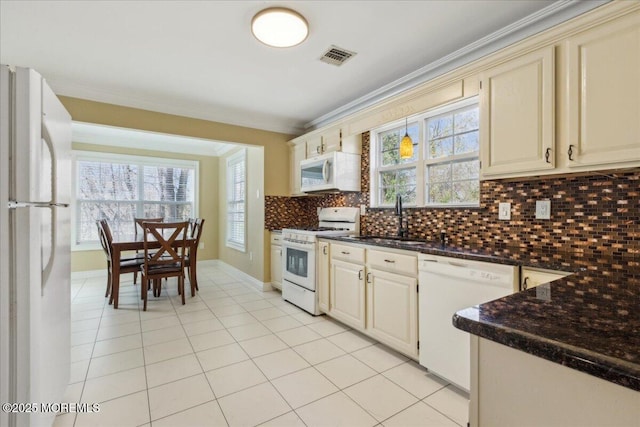 34 Crescent Rd, Old Bridge, NJ 08857 - kitchen featuring white appliances, a sink, ornamental molding, tasteful backsplash, and light tile patterned floors