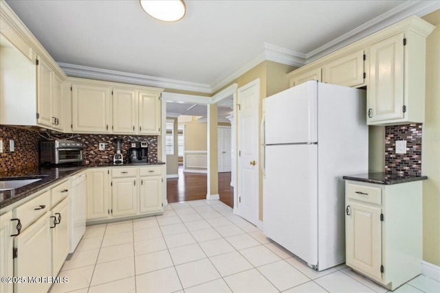 34 Crescent Rd, Old Bridge, NJ 08857 - kitchen with white appliances, cream cabinetry, tasteful backsplash, ornamental molding, and dark stone countertops