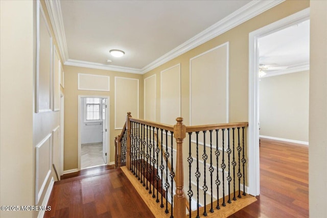 34 Crescent Rd, Old Bridge, NJ 08857 - hall with ornamental molding, an upstairs landing, wood finished floors, and baseboards