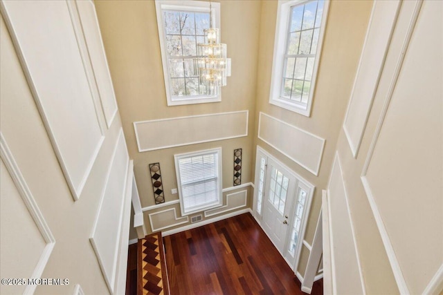 34 Crescent Rd, Old Bridge, NJ 08857 - foyer featuring dark wood finished floors, a high ceiling, and a chandelier