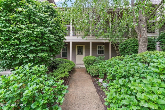 view of outbuilding with covered porch