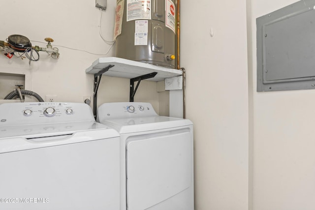 washroom with water heater, separate washer and dryer, and electric panel