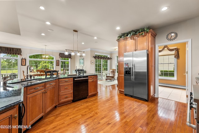 68 Hedgerow Ln, Manalapan, NJ 07726 - kitchen with stainless steel refrigerator with ice dispenser, dishwasher, a sink, a baseboard radiator, and brown cabinetry