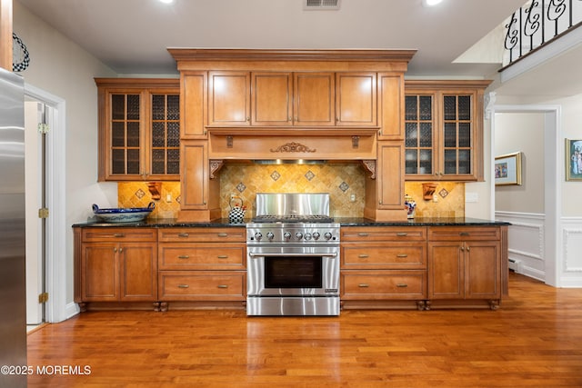 68 Hedgerow Ln, Manalapan, NJ 07726 - kitchen featuring stainless steel range, brown cabinets, light wood-style flooring, and recessed lighting