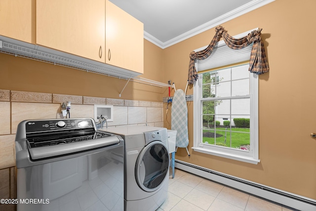 68 Hedgerow Ln, Manalapan, NJ 07726 - laundry room featuring a baseboard heating unit, cabinet space, washing machine and dryer, crown molding, and light tile patterned floors