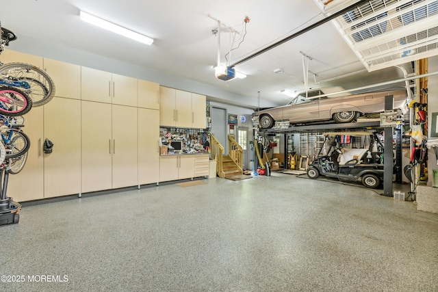 68 Hedgerow Ln, Manalapan, NJ 07726 - garage featuring a garage door opener