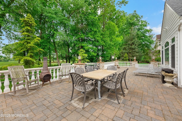 68 Hedgerow Ln, Manalapan, NJ 07726 - view of patio with outdoor dining space and view of scattered trees