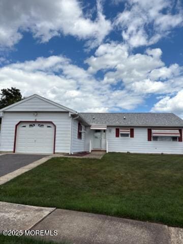 4 Flamingo Way, Toms River, NJ 08757 - ranch-style house featuring a front lawn, an attached garage, and driveway
