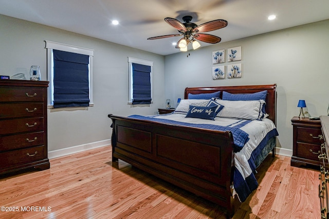 bedroom featuring light wood-style floors, baseboards, recessed lighting, and ceiling fan